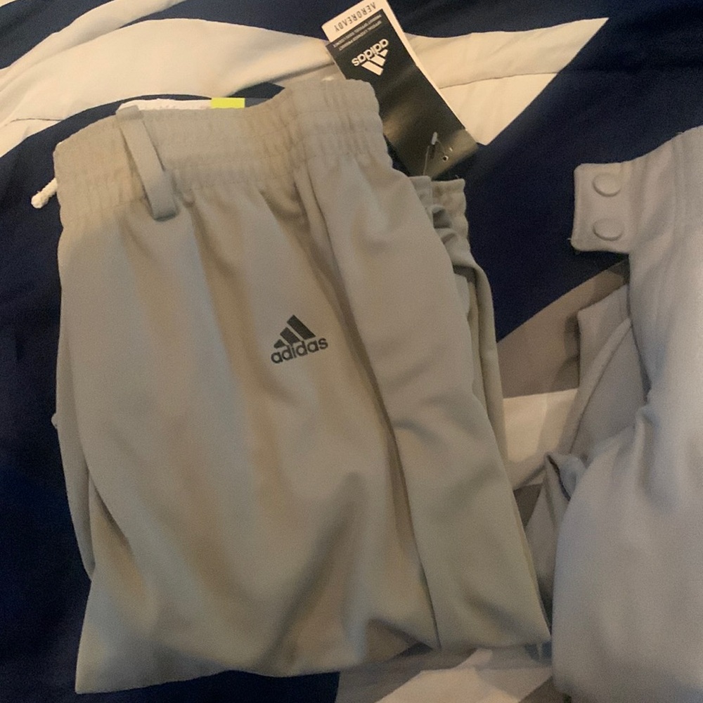 2 pairs of adidas baseball pants